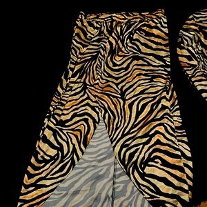A SHEIN two piece half top and a high low skirt polyester blend material
